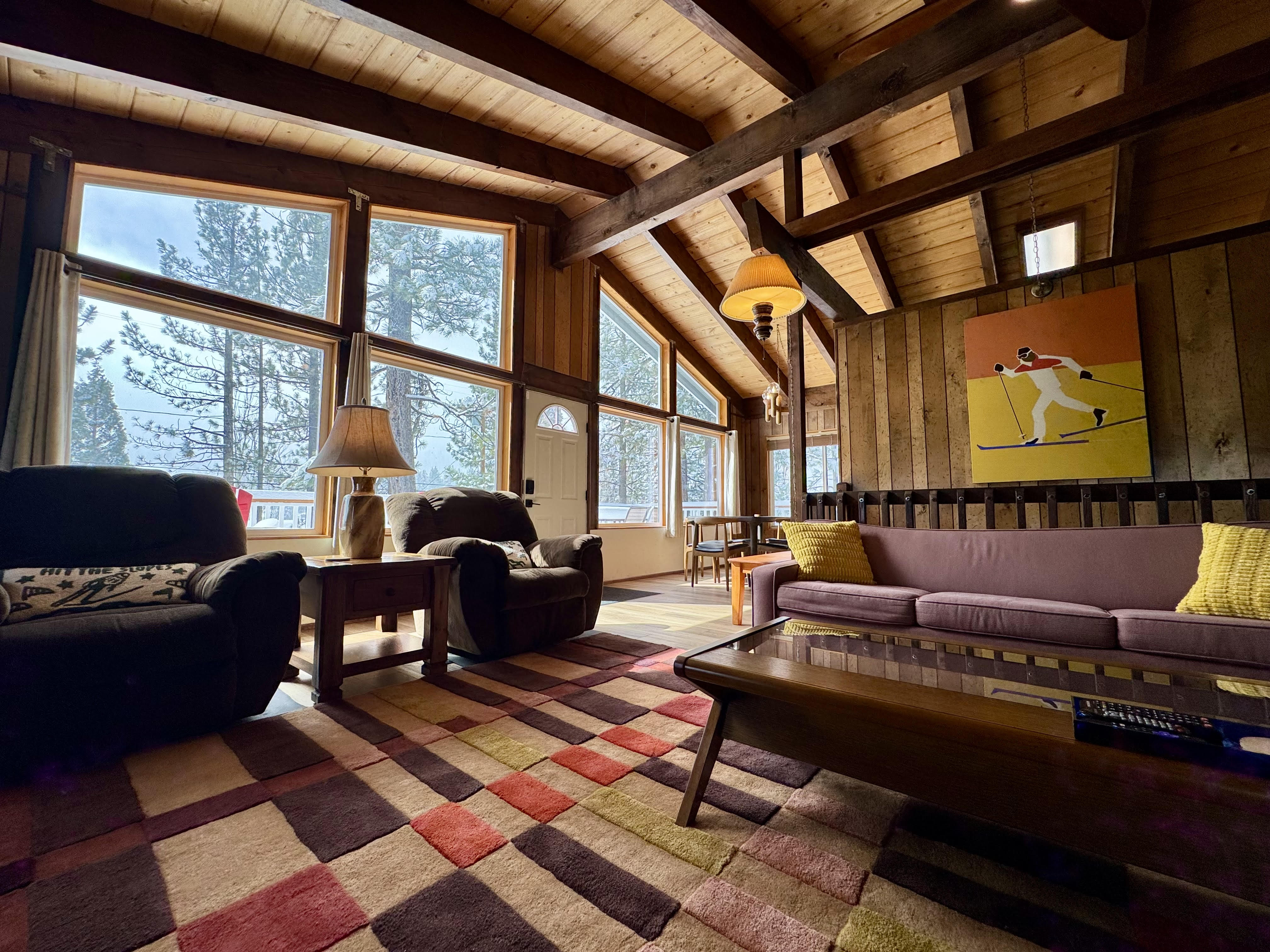Cabin living room with vaulted ceiling at Bear View Escape in Big Bear Lake